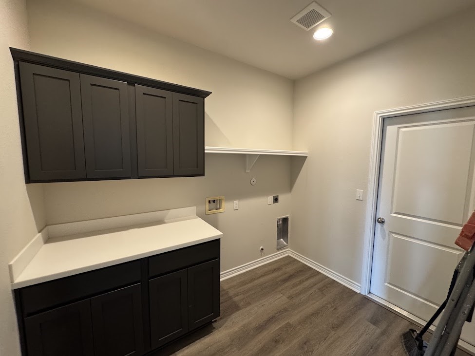 2658 Westeros Street Corpus Christi, TX 78415 - Photo 8 of 13 a kitchen with a sink and a refrigerator