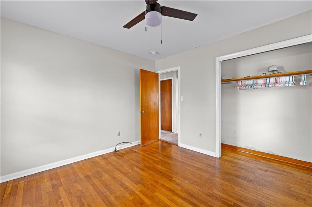 104 Denham Street Thomaston, GA 30286 - Photo 19 of 26 wooden floor in an empty room