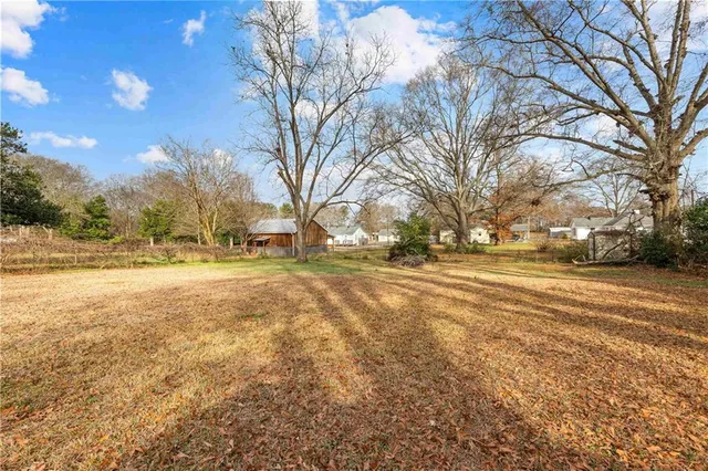 a view of road with covered with trees