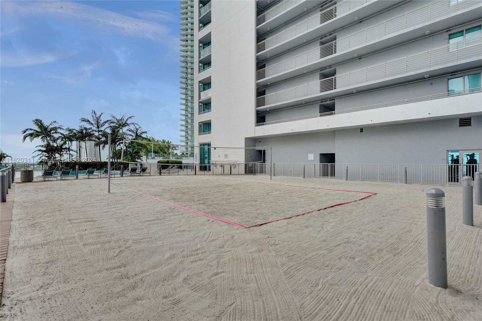 888 Biscayne Boulevard, Unit 509 Miami, FL 33132 - Photo 26 of 32 a view of a building with a yard