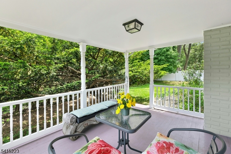 33 Carol Road Westfield, NJ 07090 - Photo 19 of 23 a balcony with furniture and wooden floor