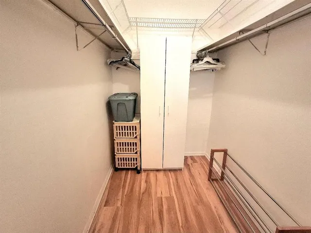 a view of balcony with wooden floor