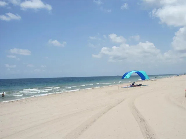 a group of people walking down a street