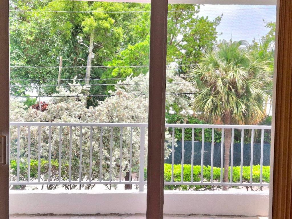 1421 South Ocean Boulevard, Unit 206 Pompano Beach, FL 33062 - Photo 5 of 40 a view of a garden
