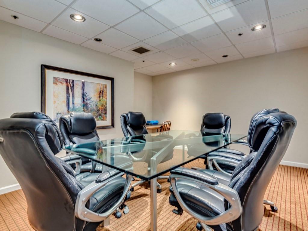 40 North Interstate Highway 35, Unit 6C1 Austin, TX 78701 - Photo 35 of 37 a view of a workspace with furniture and a chandelier