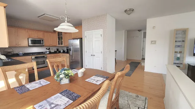 a view of a dining room with furniture