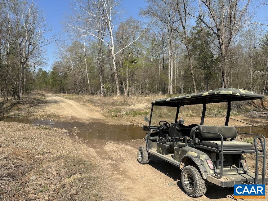 Tbd Tbd Rolling Road Scottsville, VA 24590 - Photo 11 of 19 a view of a bike and car parked in the road