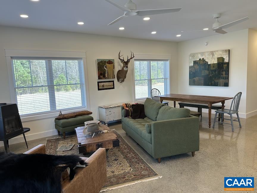 Tbd Tbd Rolling Road Scottsville, VA 24590 - Photo 15 of 19 a living room with furniture and a large window