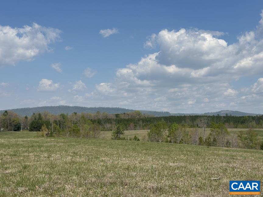 Tbd Tbd Rolling Road Scottsville, VA 24590 - Photo 2 of 19 a view of a lake with a big yard