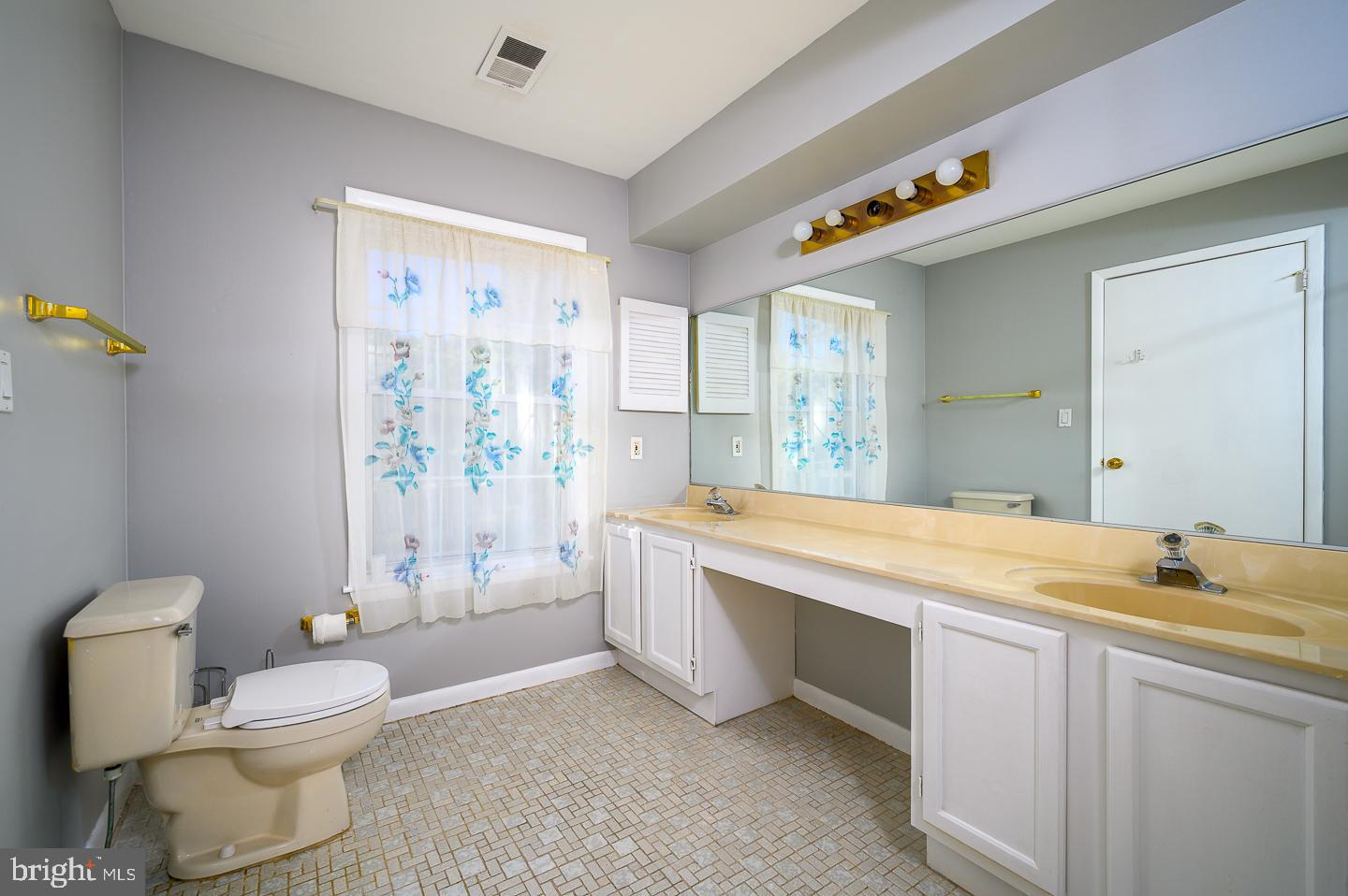 115 Cascade Court, Unit 7 Princeton, NJ 08540 - Photo 13 of 27 a spacious bathroom with a granite countertop sink a toilet a shower and a mirror
