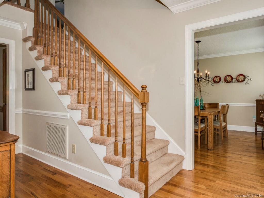 7301 Alexander Road Charlotte, NC 28270 - Photo 3 of 24 a view of entryway and hall with wooden floor