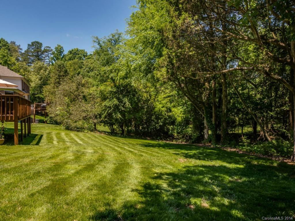 7301 Alexander Road Charlotte, NC 28270 - Photo 22 of 24 a view of a yard with a tree