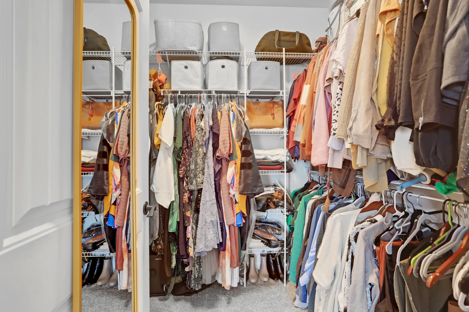 3323 Boulder Ridge Drive Champaign, IL 61822 - Photo 15 of 27 a view of walk in closet with clothes