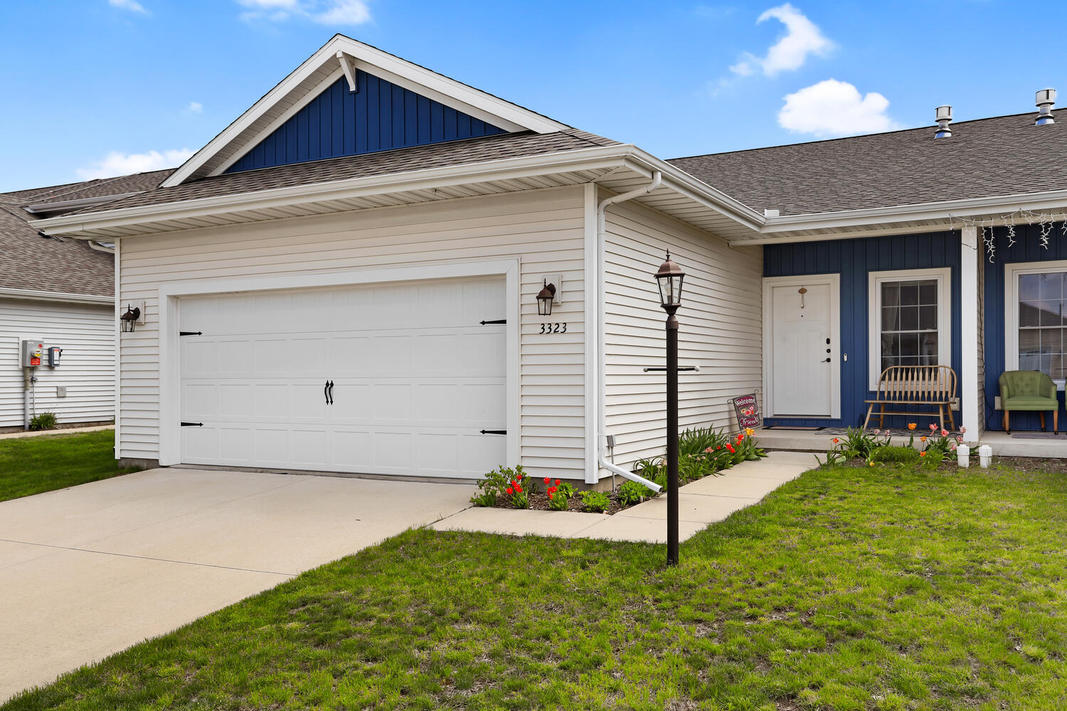 3323 Boulder Ridge Drive Champaign, IL 61822 - Photo 2 of 27 a front view of a house with a yard