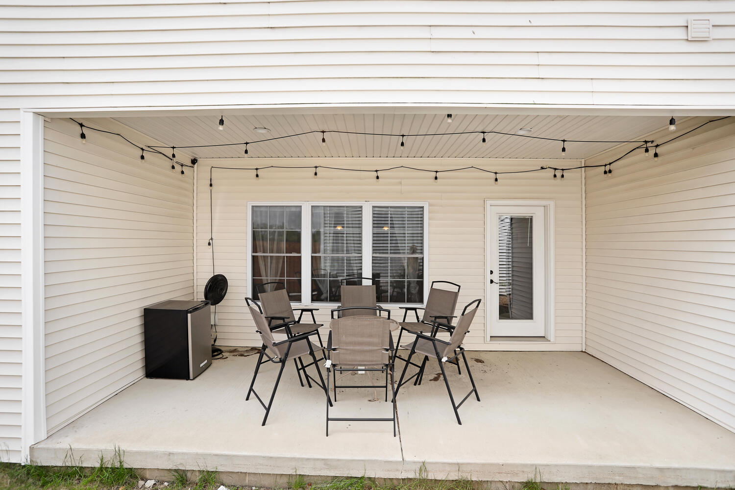 3323 Boulder Ridge Drive Champaign, IL 61822 - Photo 24 of 27 a view of a patio with table and chairs and potted plants