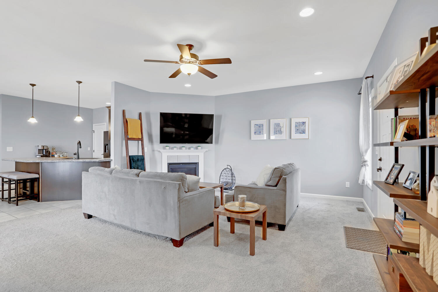 3323 Boulder Ridge Drive Champaign, IL 61822 - Photo 6 of 27 a living room with furniture and a flat screen tv
