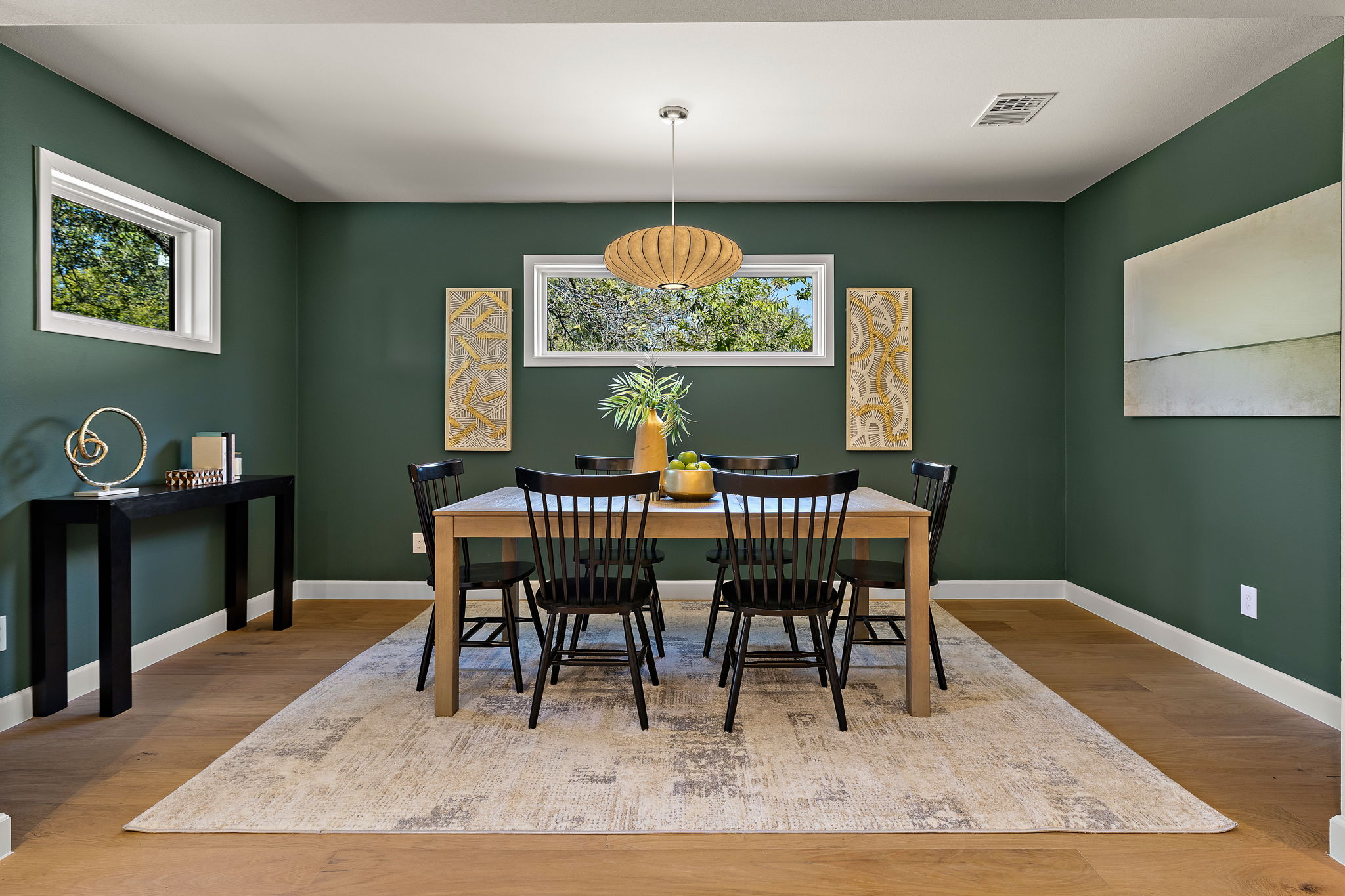 8102 Burrell Drive Austin, TX 78757 - Photo 14 of 35 a view of a dining room with furniture window and wooden floor