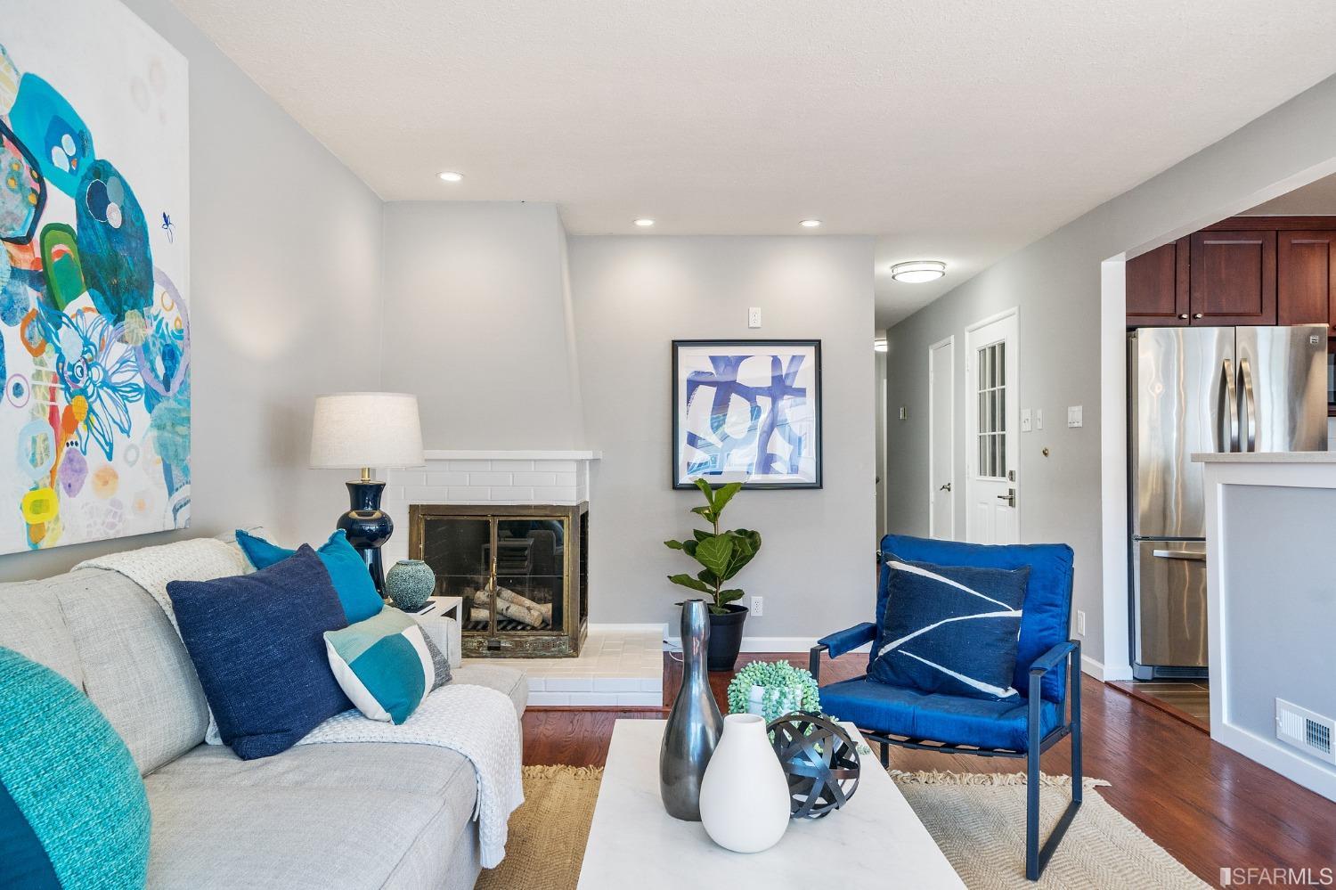 67 Marshall Way Daly City, CA 94014 - Photo 11 of 42 a living room with furniture fireplace and wooden floor