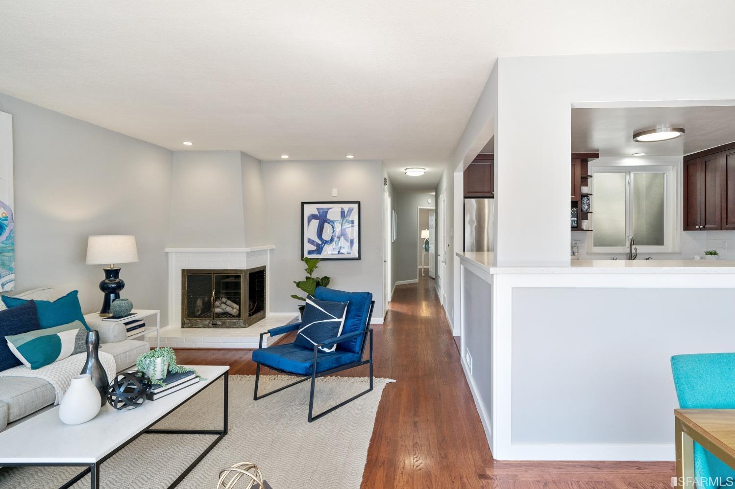 67 Marshall Way Daly City, CA 94014 - Photo 12 of 42 a living room with furniture and a fireplace