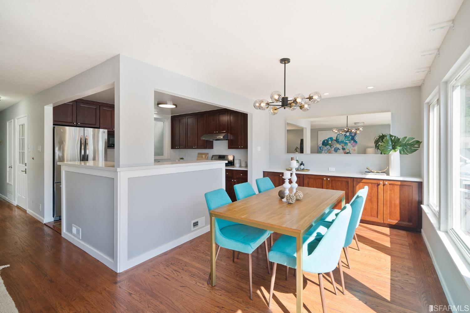 67 Marshall Way Daly City, CA 94014 - Photo 14 of 42 a view of a dining room with furniture window and wooden floor