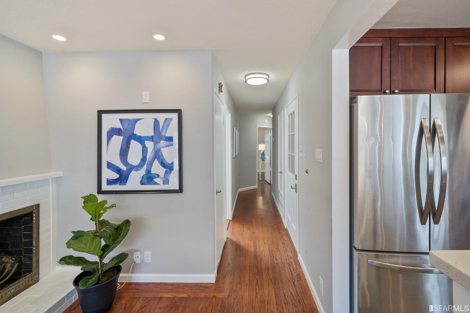 67 Marshall Way Daly City, CA 94014 - Photo 20 of 42 a view of a refrigerator in kitchen and wooden floor