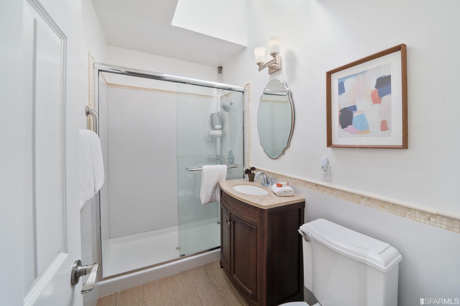 67 Marshall Way Daly City, CA 94014 - Photo 21 of 42 a bathroom with a sink mirror toilet and shower