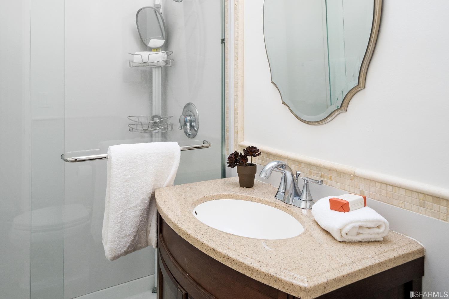 67 Marshall Way Daly City, CA 94014 - Photo 22 of 42 a bathroom with a sink and a mirror