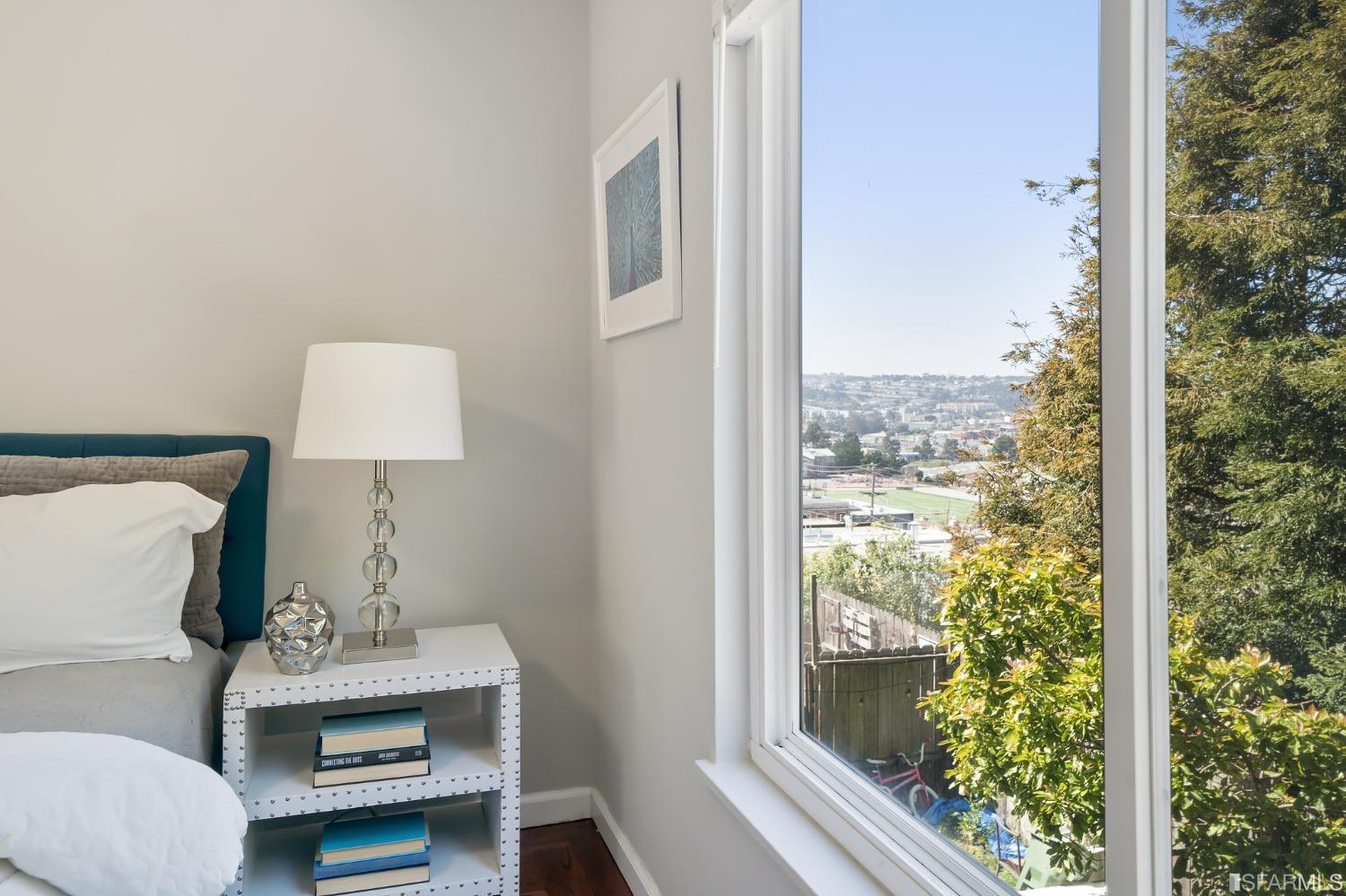 67 Marshall Way Daly City, CA 94014 - Photo 26 of 42 a room with furniture and a window