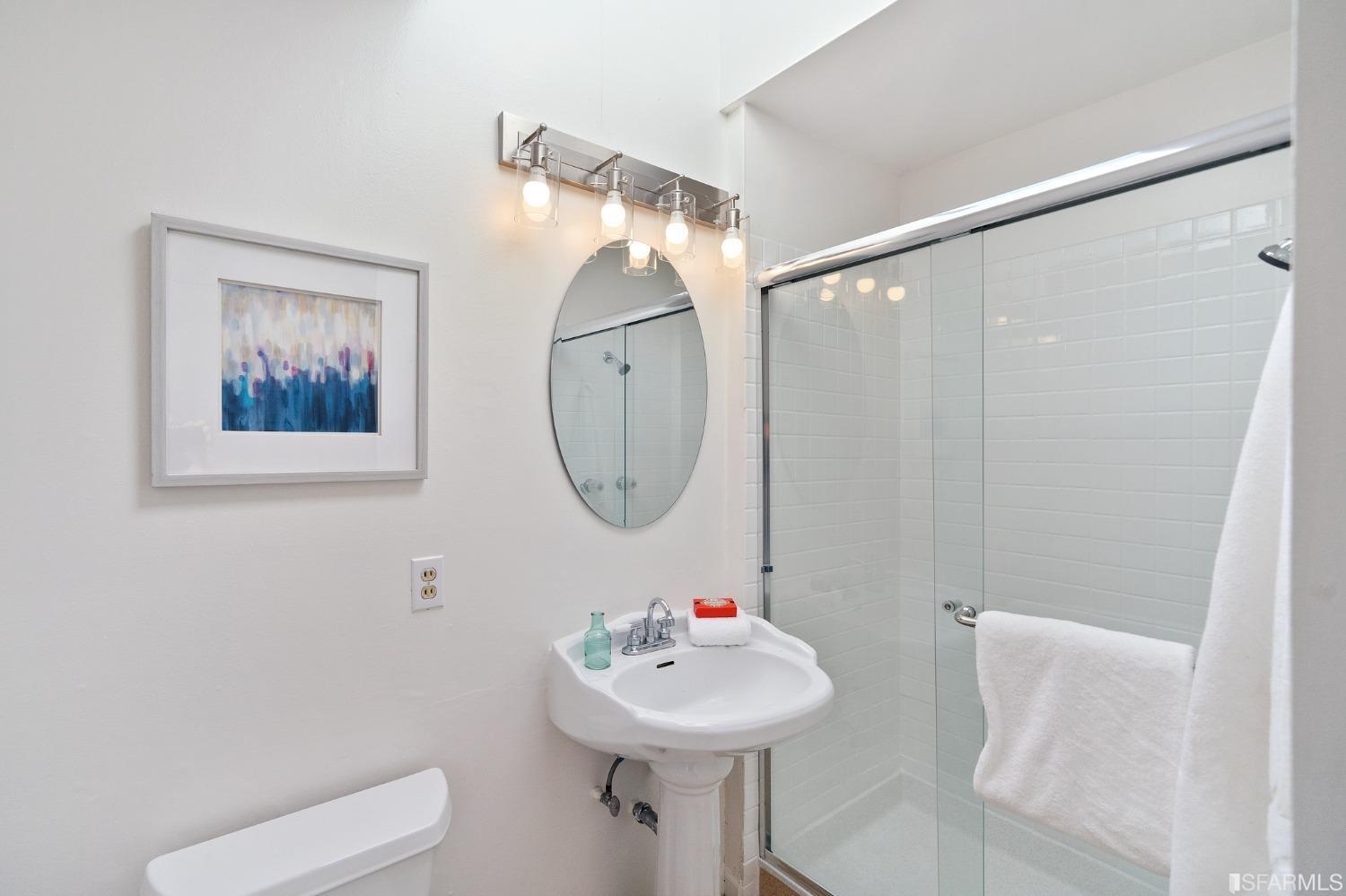 67 Marshall Way Daly City, CA 94014 - Photo 29 of 42 a bathroom with a sink mirror and toilet