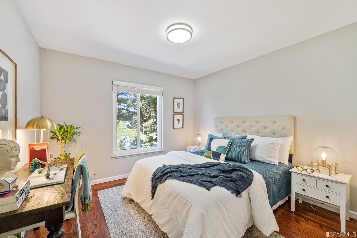 67 Marshall Way Daly City, CA 94014 - Photo 30 of 42 a bedroom with a bed and a lamp on dresser