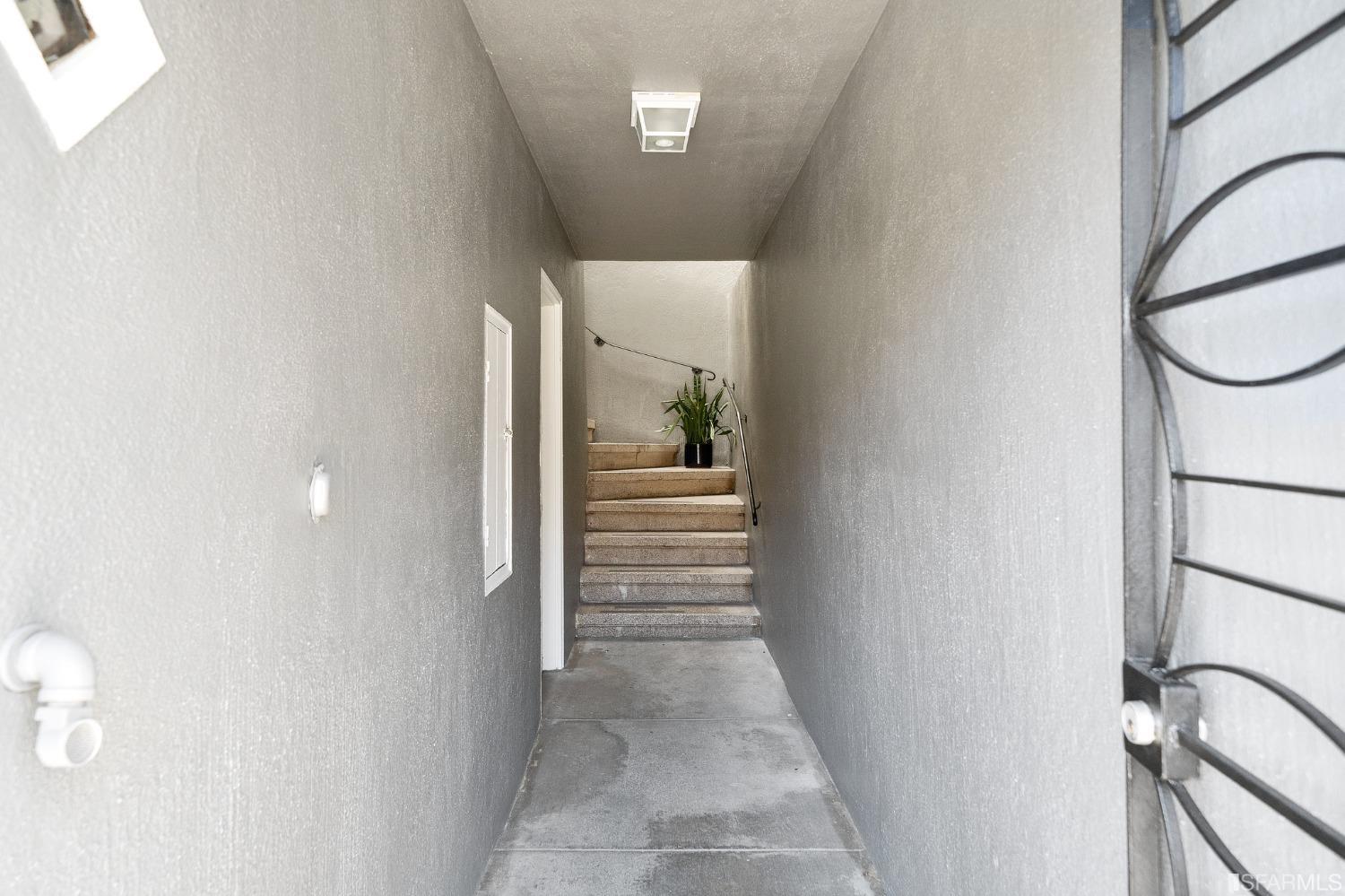 67 Marshall Way Daly City, CA 94014 - Photo 3 of 42 a view of a hallway with staircase