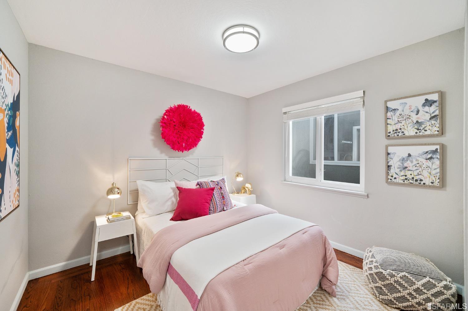 67 Marshall Way Daly City, CA 94014 - Photo 33 of 42 a bedroom with a bed and a painting on the wall