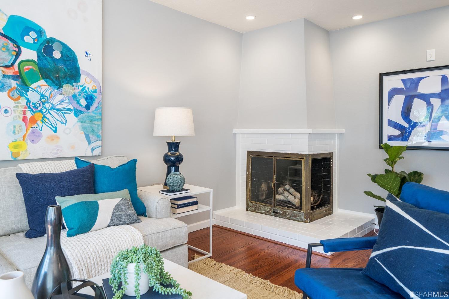 67 Marshall Way Daly City, CA 94014 - Photo 9 of 42 a living room with furniture and a fireplace
