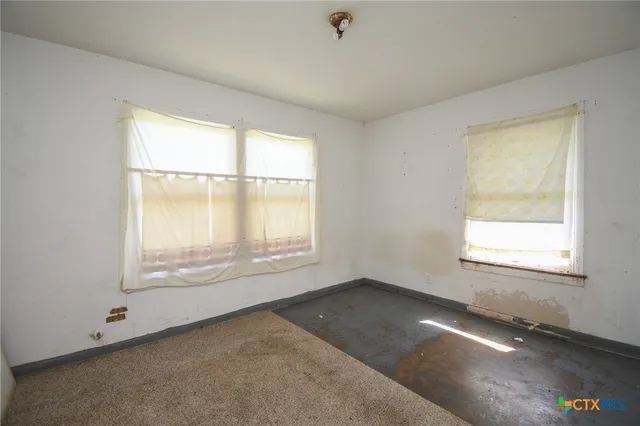 an empty room with a window