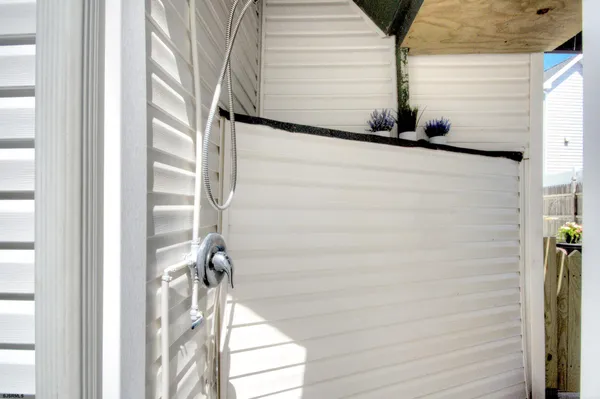 a view of a deck with furniture