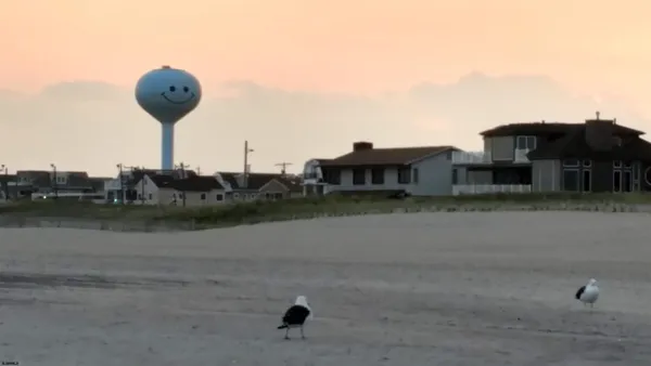 a view of a city with ocean