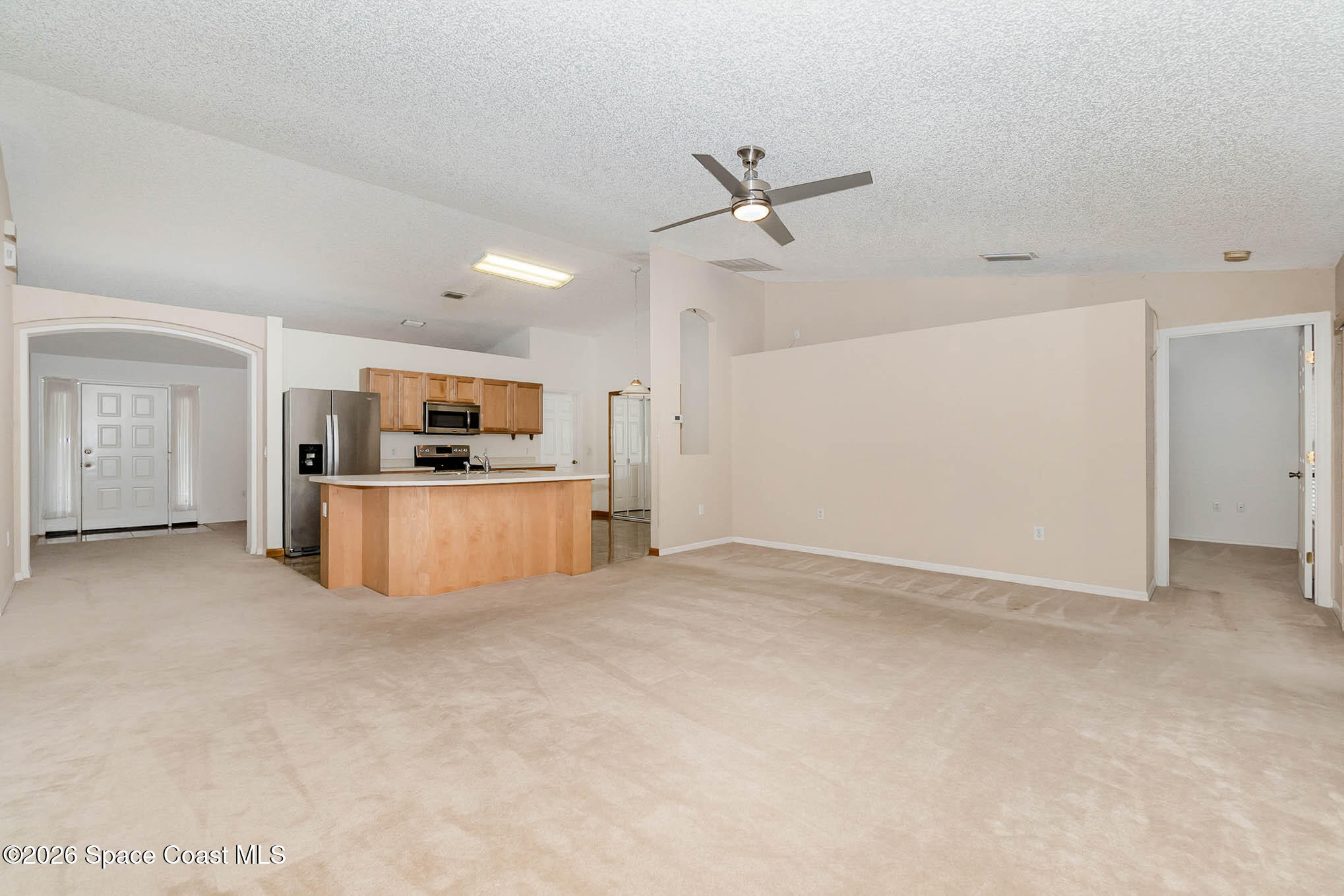787 Seymour Road Northeast Palm Bay, FL 32905 - Photo 2 of 15 Family-Kitchen