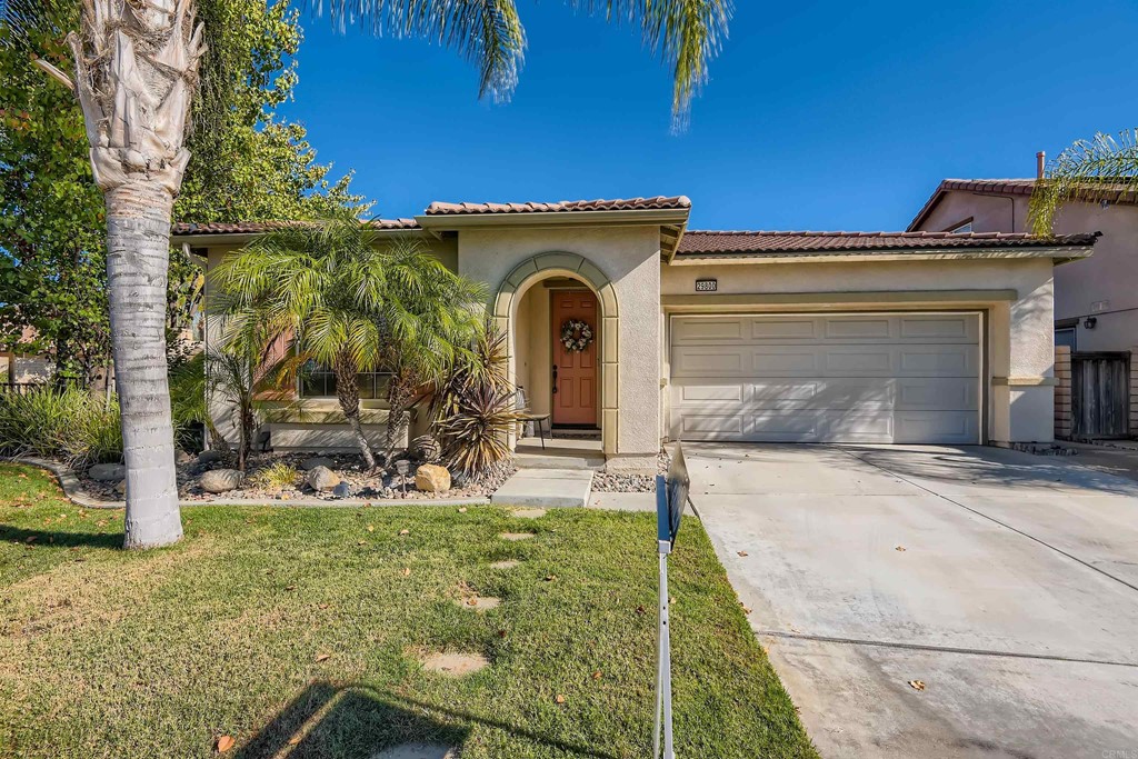29800 Bay View Way Menifee, CA 92584 - Photo 1 of 1 a front view of a house with garden