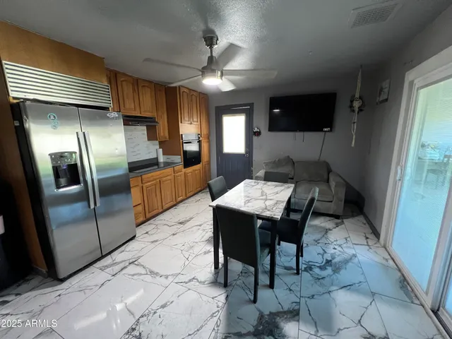 a spacious bathroom with a toilet sink and shower