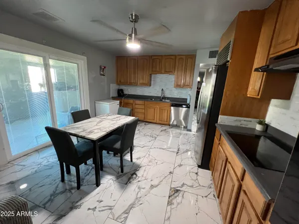 a view of a dining room with furniture