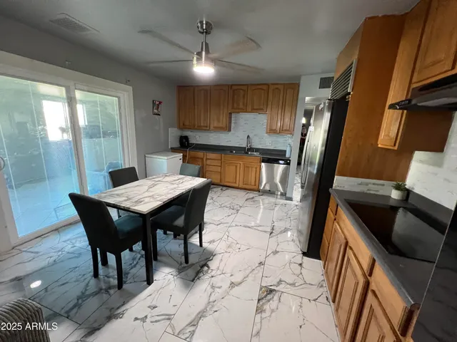 a view of a dining room with furniture