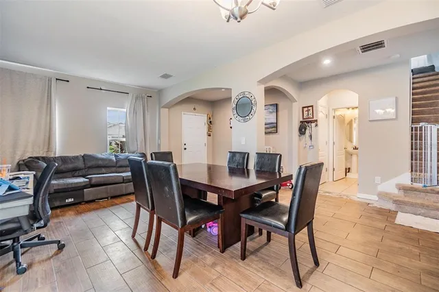 a view of a dining room with furniture