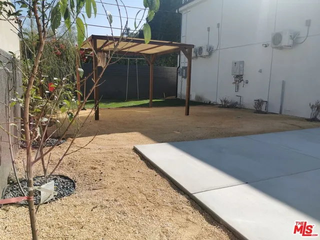 a park view with potted plants