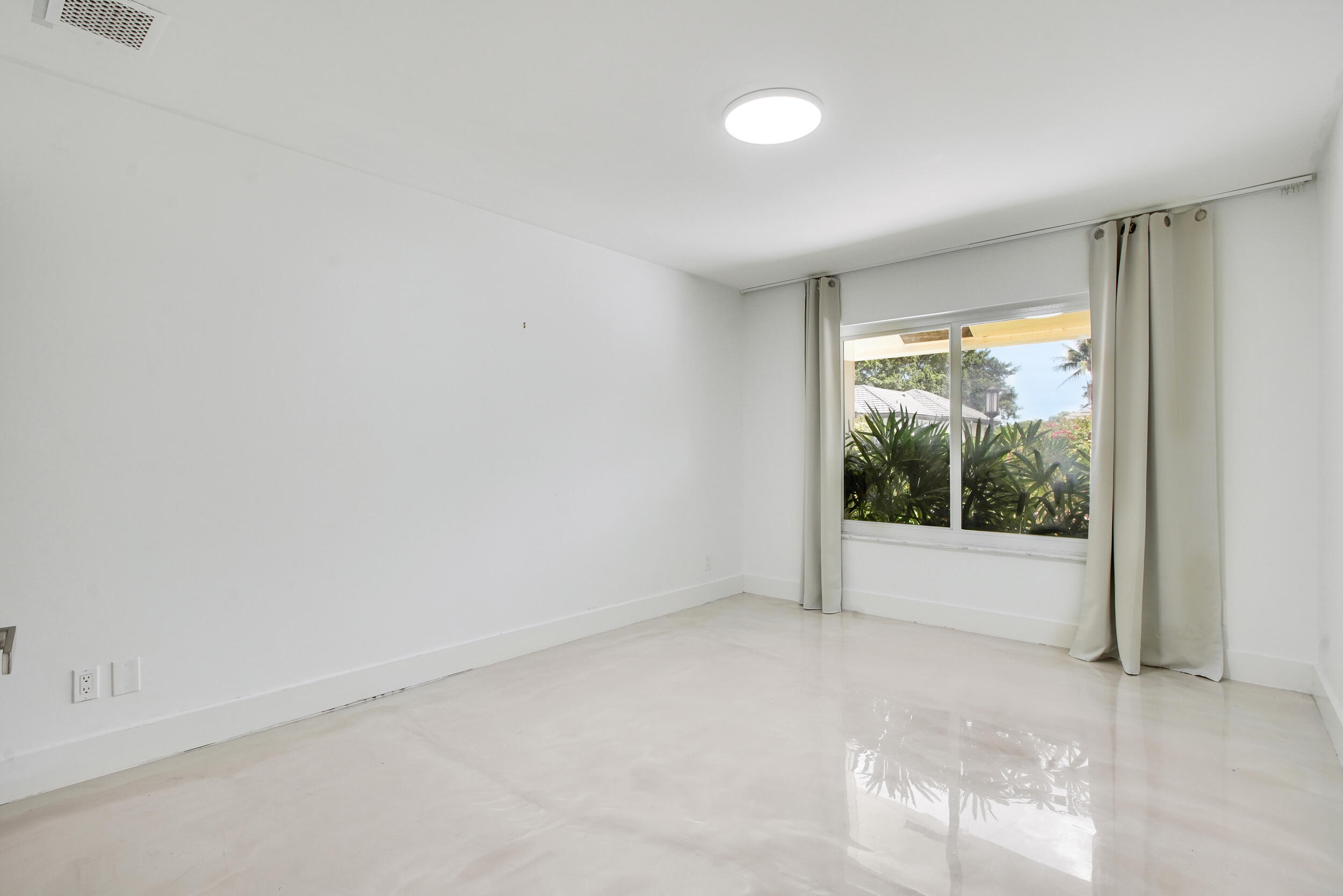 7351 Valencia Drive Boca Raton, FL 33433 - Photo 20 of 39 a view of empty room with window