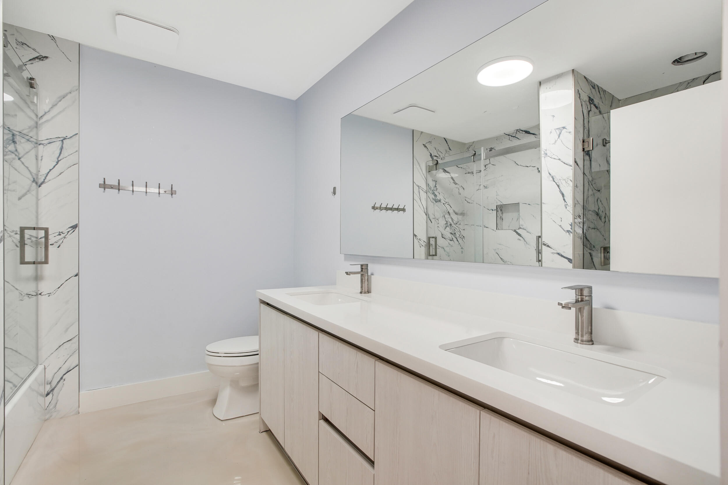 7351 Valencia Drive Boca Raton, FL 33433 - Photo 22 of 39 a bathroom with a sink toilet and shower