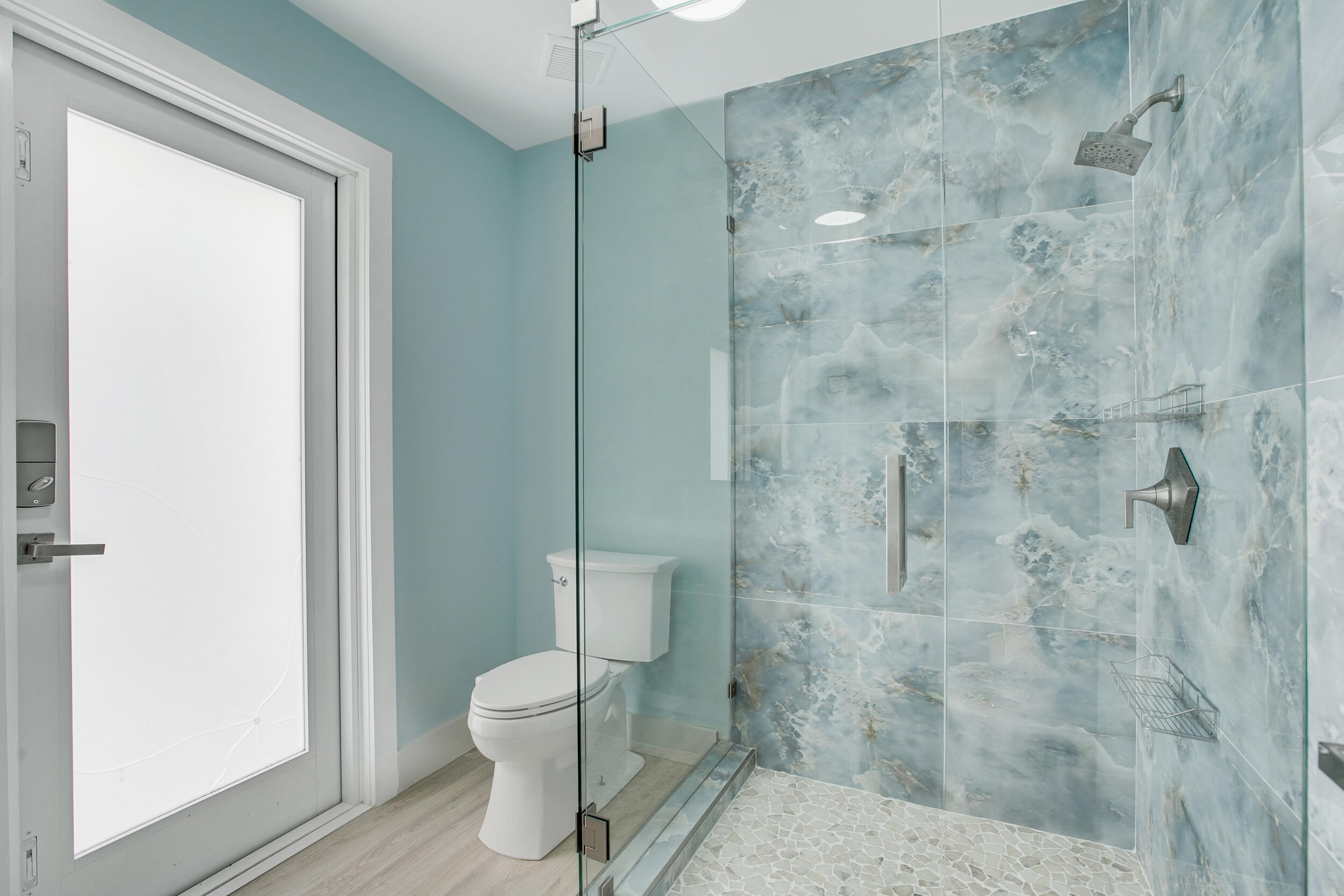 7351 Valencia Drive Boca Raton, FL 33433 - Photo 32 of 39 a bathroom with a shower and a toilet