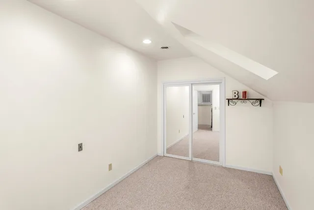 an empty room with glass door