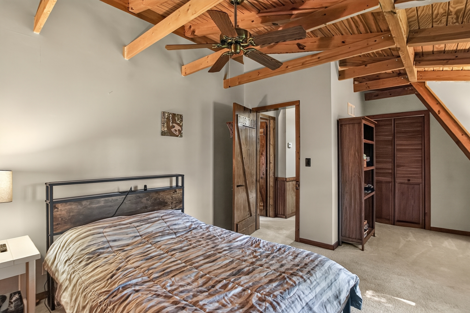 4615 East 2619th Road Sandwich, IL 60548 - Photo 24 of 36 a bedroom with a bed and a ceiling fan