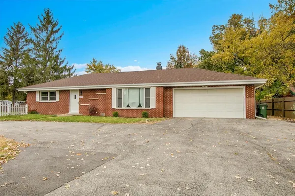 front view of a house and a yard