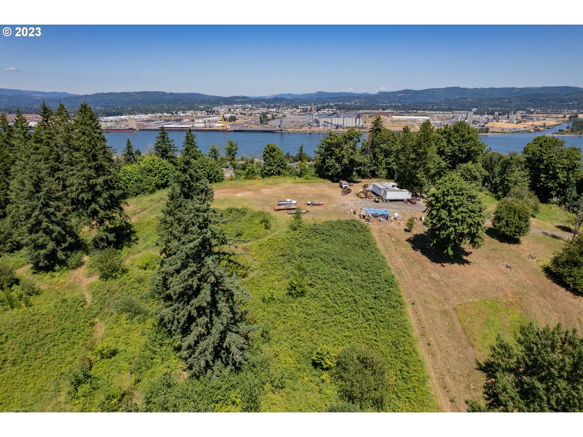 Debast Road Rainier, OR 97048 - Photo 12 of 16 a view of a yard with a building